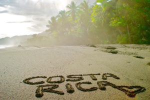 Coasta rica written on sand at athe beaach