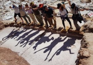 Group of people playing with shadow